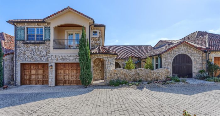 Stone exterior and tile roof of a home in Adriatica Villa District, McKinney