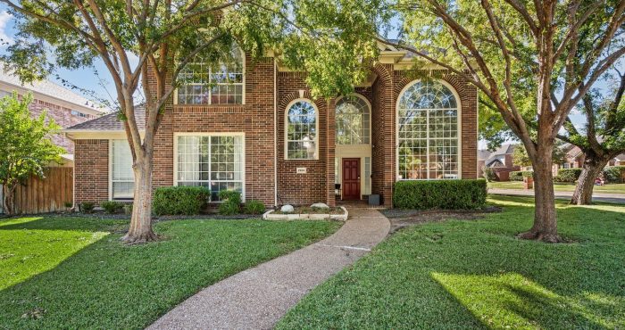 Brick home with mature trees in Hunters Creek, Plano, Texas