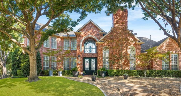 Brick home with mature trees in Cypress Point, Plano, Texas